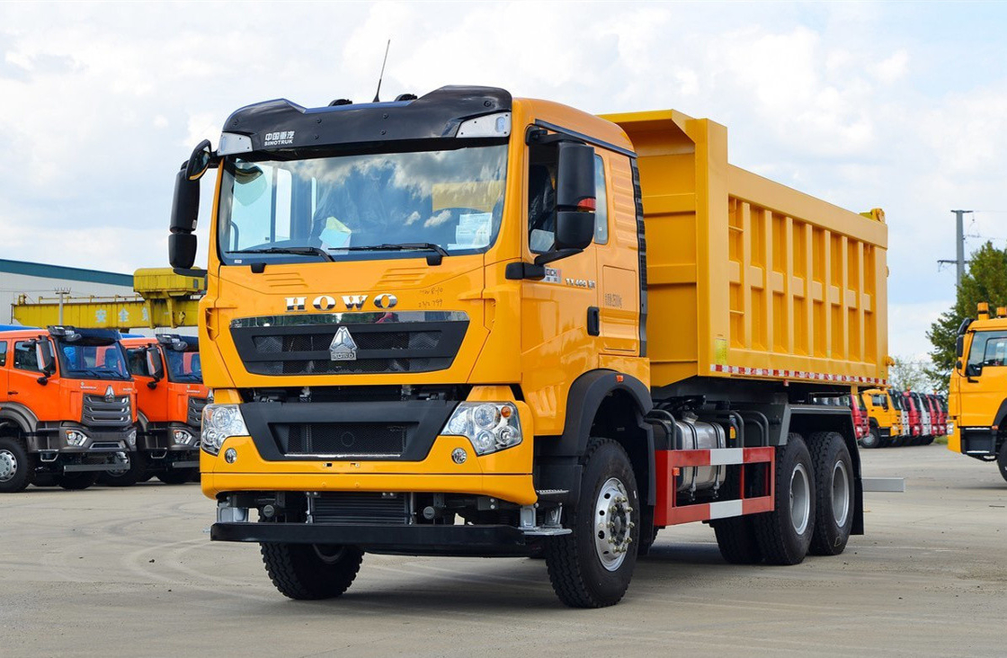 중고 10 타이어 팅퍼 트럭 6.3 미터 박스 400hp Howo TX7 전면 리프팅 12 속도 수동