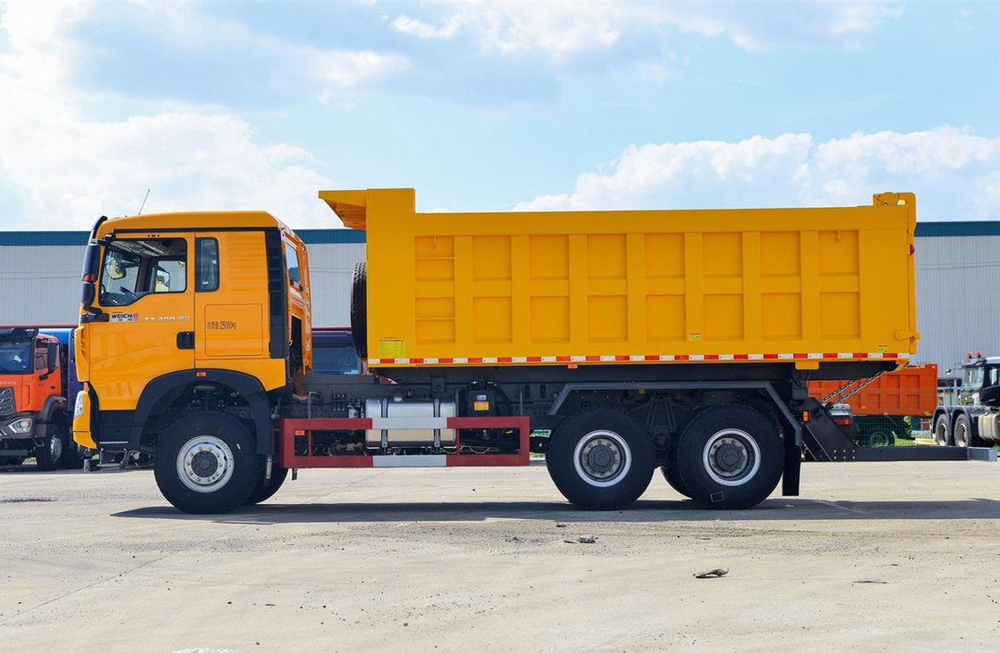 중고 10 타이어 팅퍼 트럭 6.3 미터 박스 400hp Howo TX7 전면 리프팅 12 속도 수동