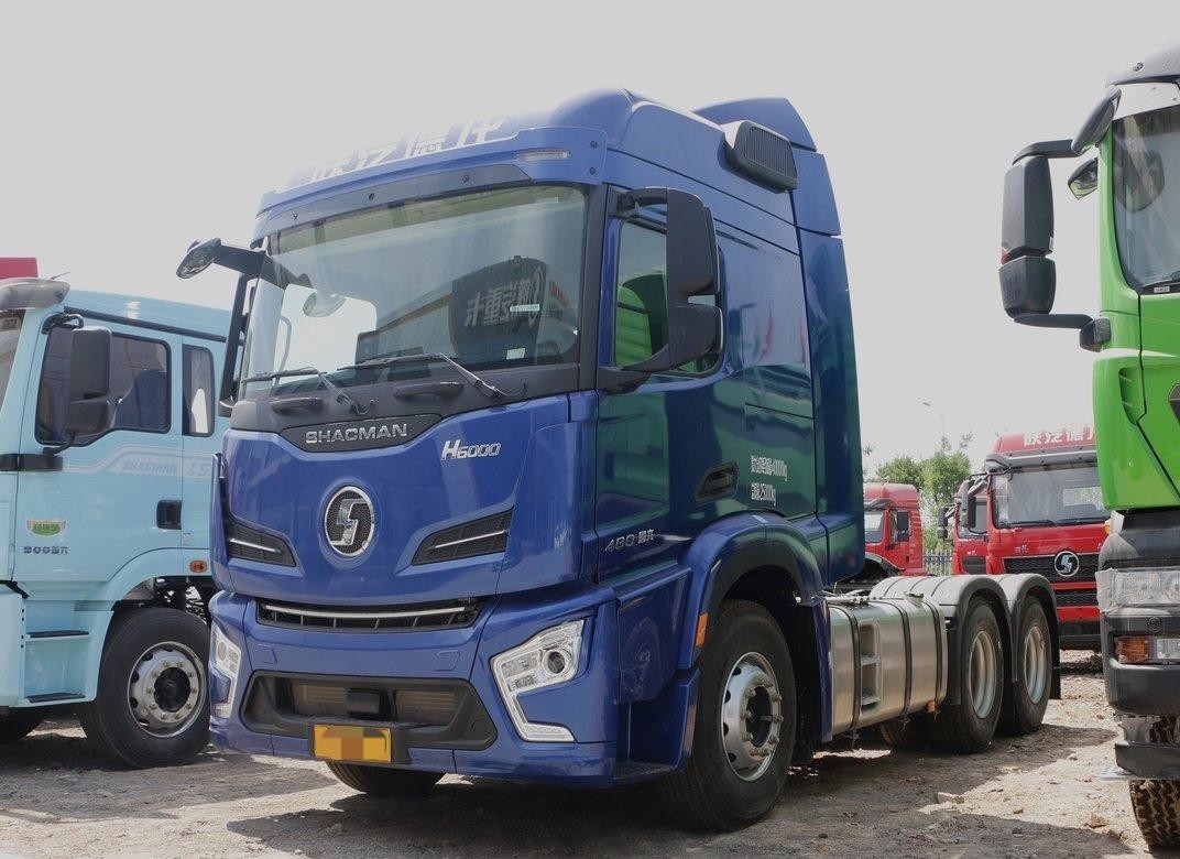 트랙터 유닛 트럭 블루 컬러 하이 옥상 캐빈 480hp 샤크만 H6000 프라임 모버 빠른 변속기