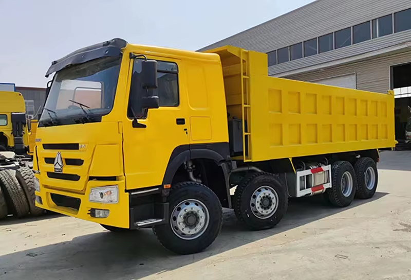 짐바브웨를 위한 중고 Howo 덤프 트럭 371hp 8x4 왼손잡이용 디젤 WP 엔진 AC 12 바퀴